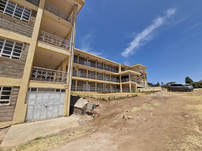 SIDE VIEW OF THE SCHOOL