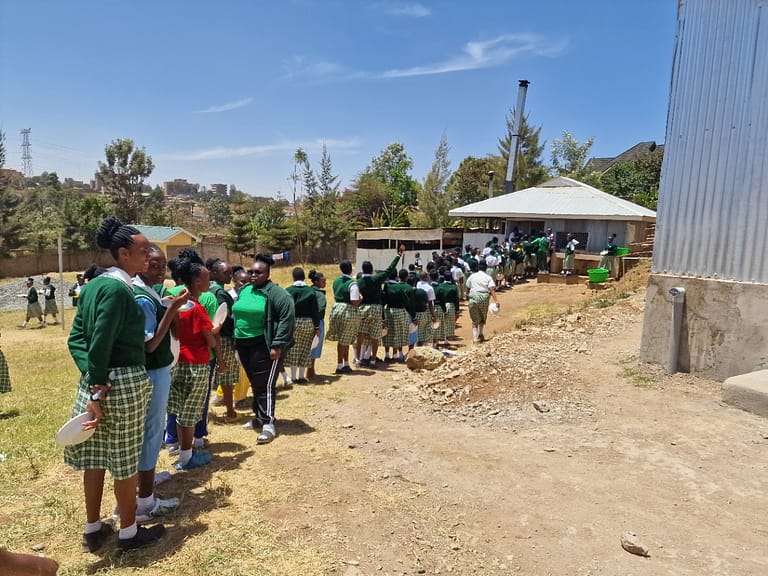 STUDENTS IN LINE TO GET THEIR MEAL