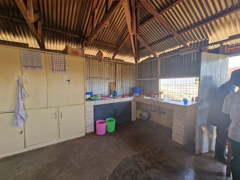 TEMPORARY METAL SHEETS STRUCTURE USED AS A KITCHEN