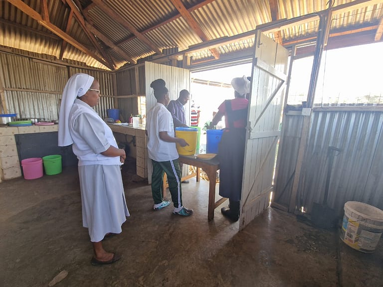 TEMPORARY METAL SHEETS STRUCTURE USED AS A KITCHEN